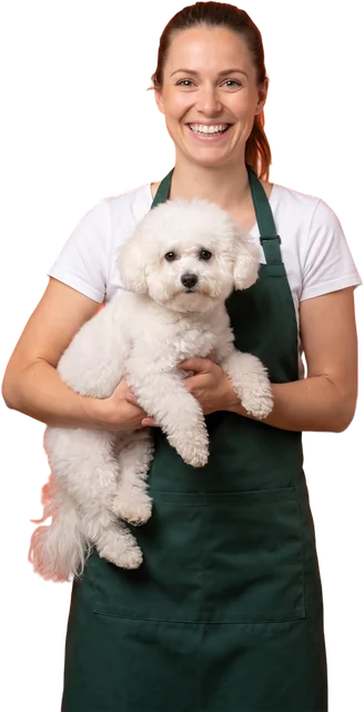 Hondentrimster met een witte hond